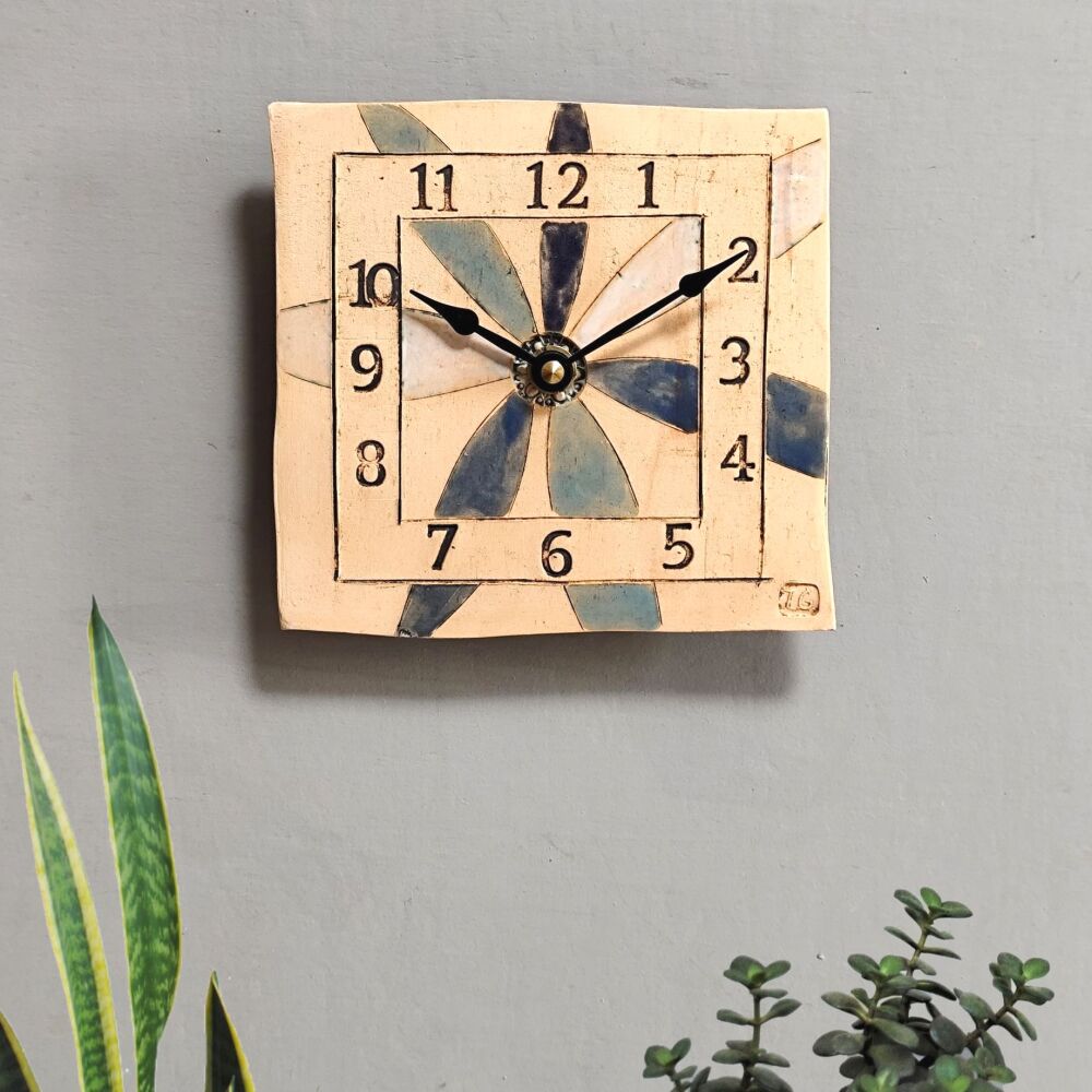Ceramic wall clock square "Large flower petals in blue"