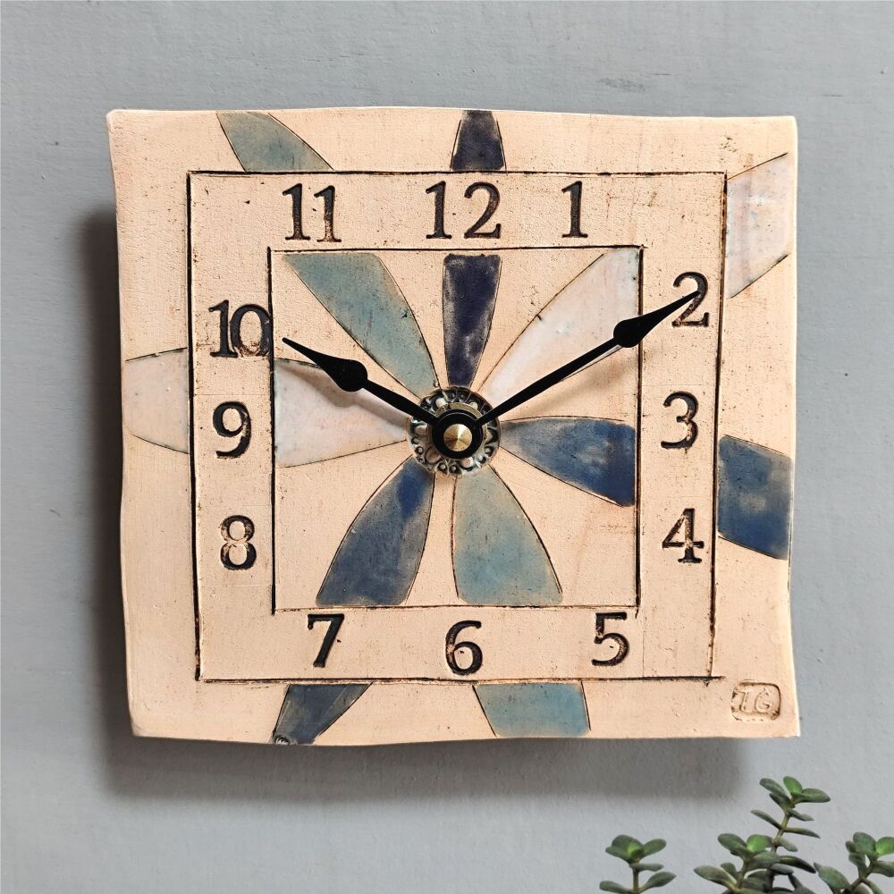 Ceramic wall clock square "Large flower petals in blue"