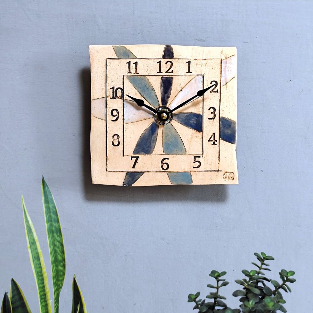 Ceramic wall clock square "Large flower petals in blue"