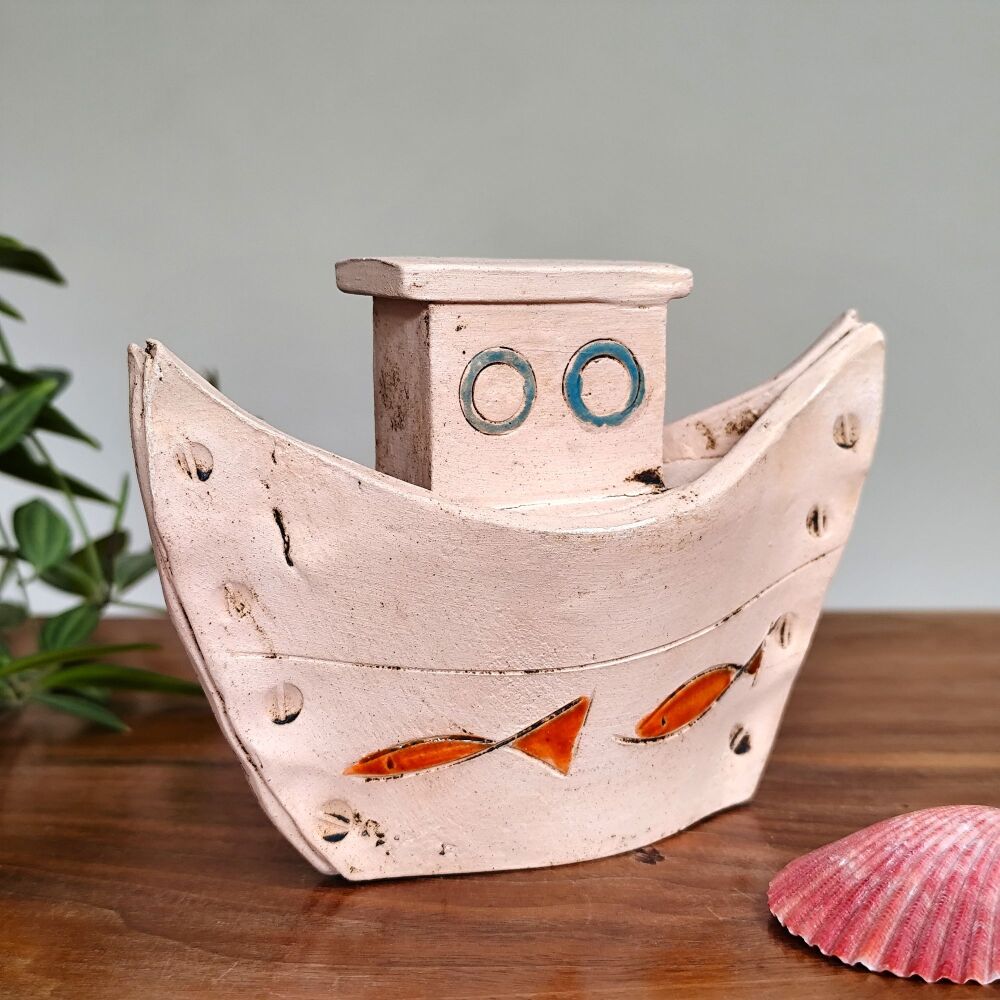 Small boat with blue details