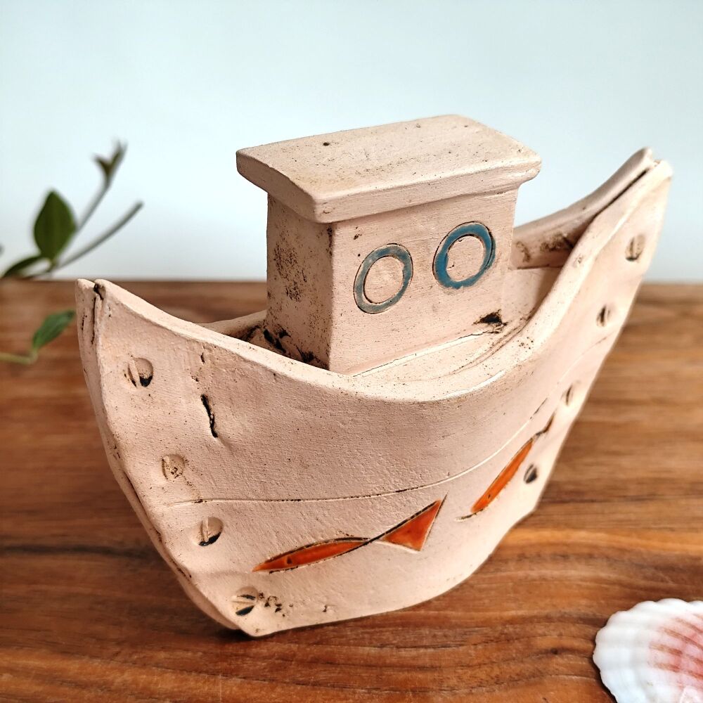 Small boat with blue details