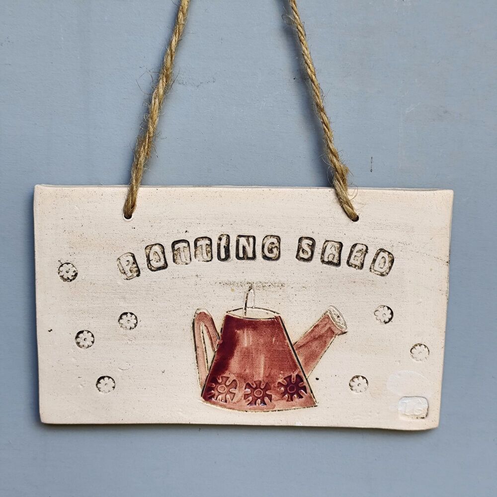 Ceramic hanging tile "Potting shed"