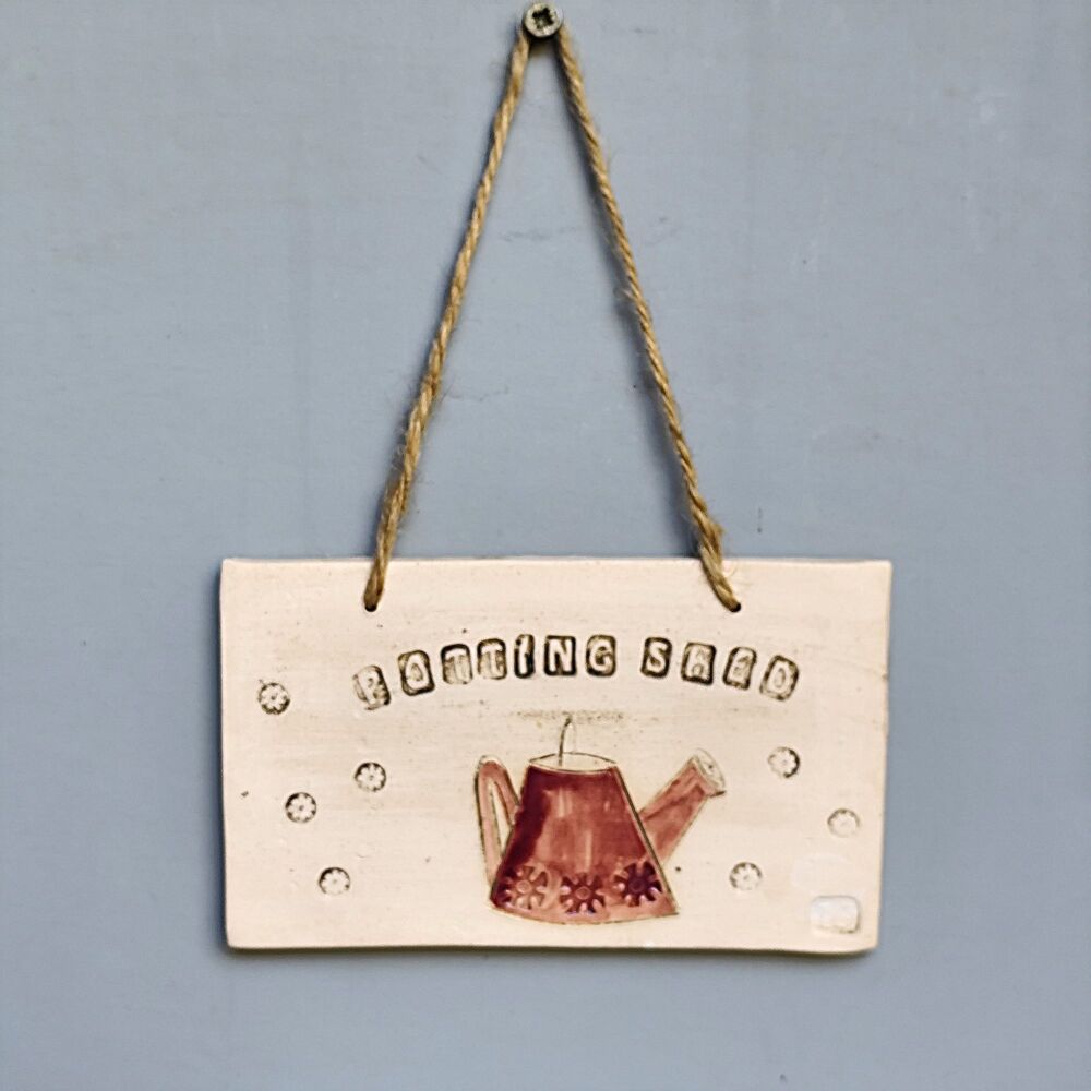 Ceramic hanging tile "Potting shed"