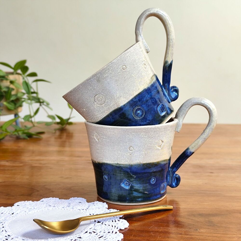 Stoneware mug in denim blue & cream stripe.