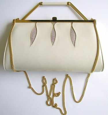 Designer bag by Gina 3 way ivory kid leather .used