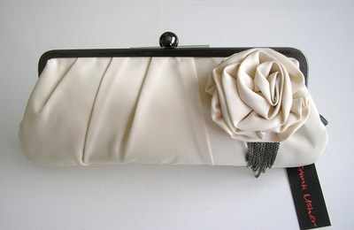 Designer bag Frank Usher beige satin clutch .rose feature.