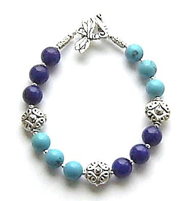 A LAPIS LAZULI AND TURQUOISE CELTIC STERLING SILVER BRACELET