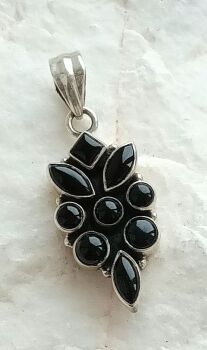 Black onyx gemstone crystal pendant