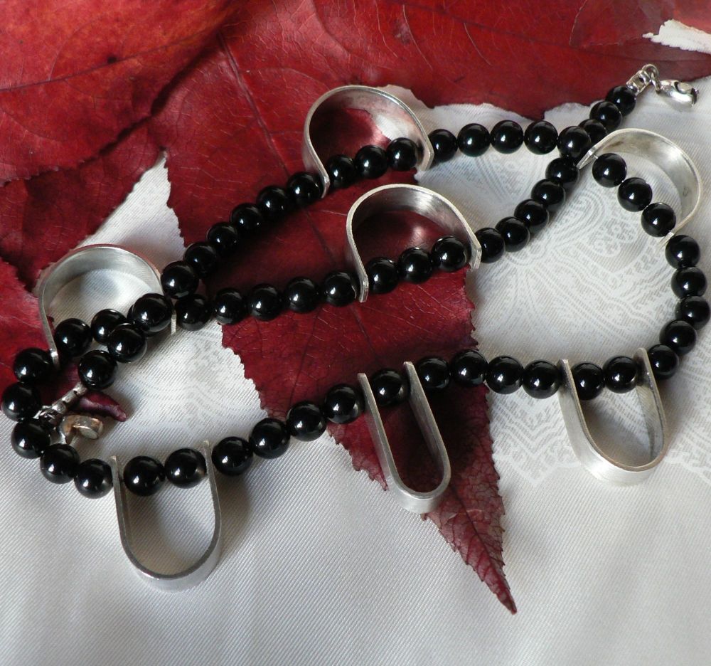 Black onyx with silver highlights