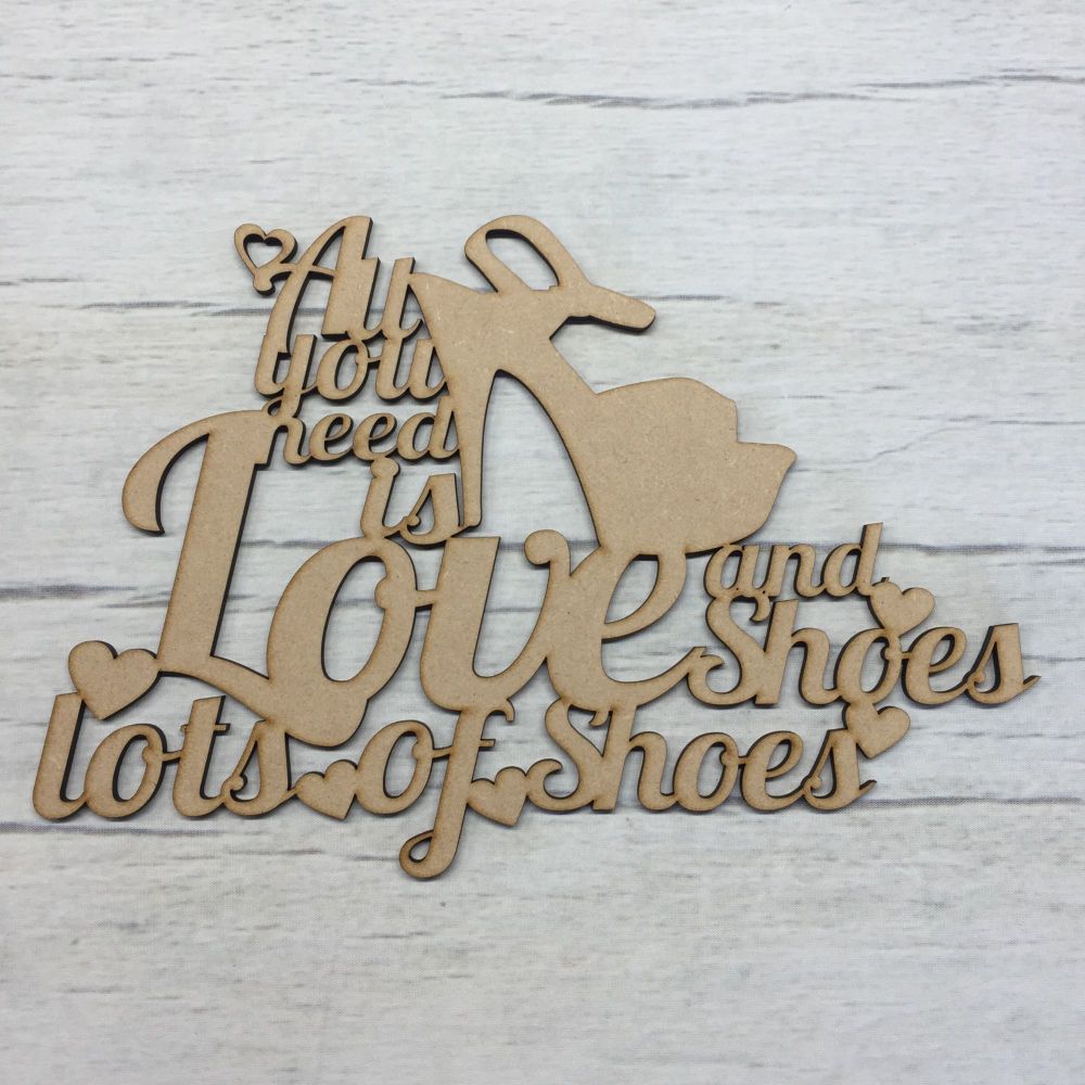 All you need is love, and shoes..' - hanging plaque
