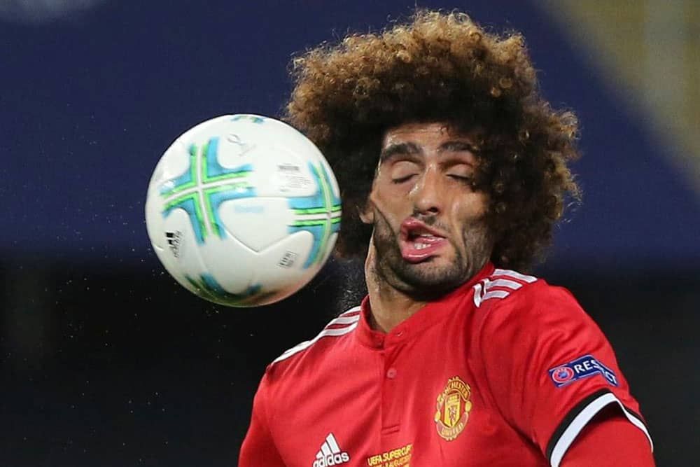 Hilarious-and-Perfectly-Timed-Sports-Photos-of-Athletes-Caught-Mid-Action-2