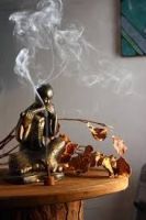 Incense and statue