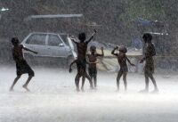 2024 boys play in monsoon rain