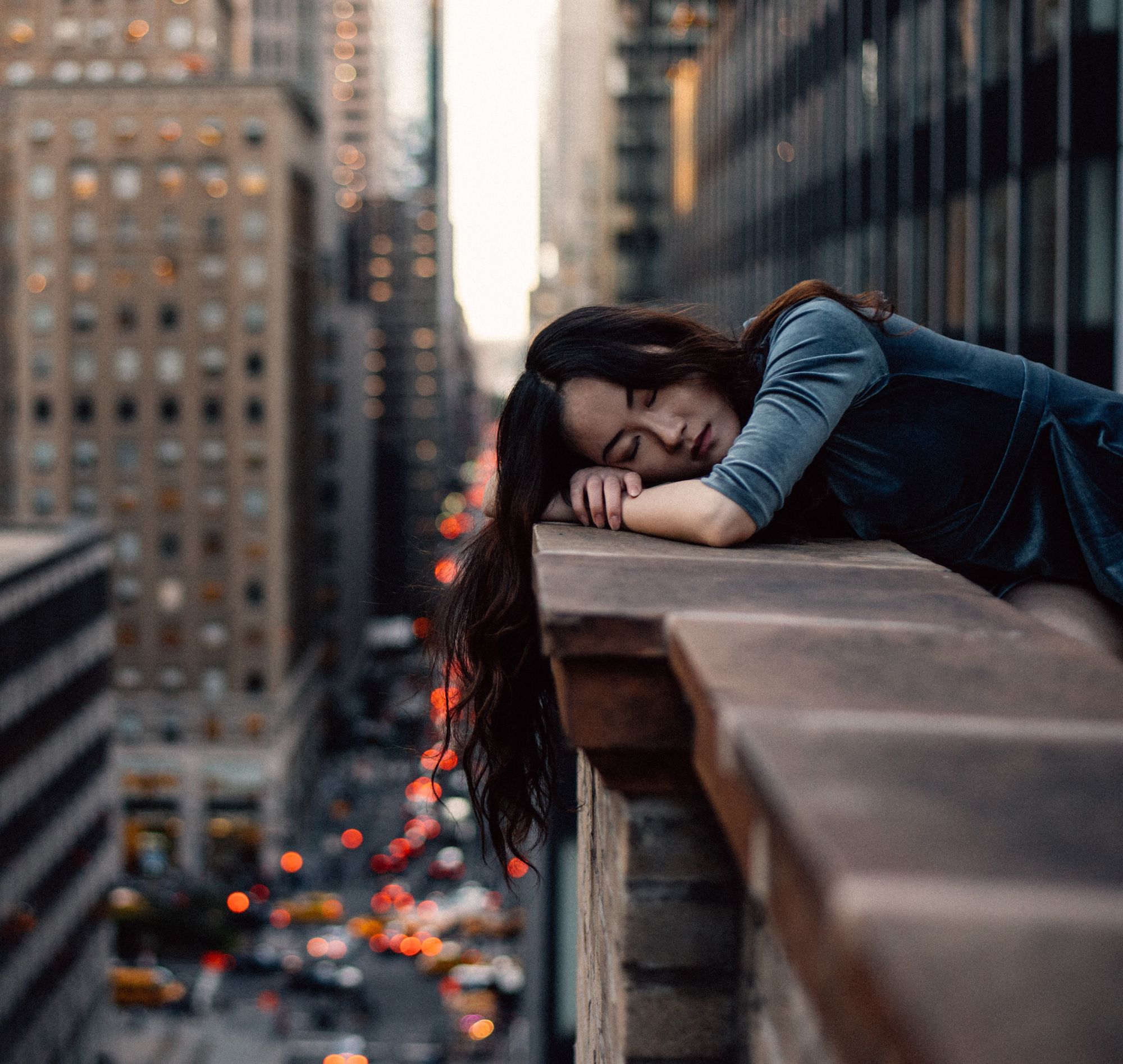 girl asleep on window ledge at work on power-up programme