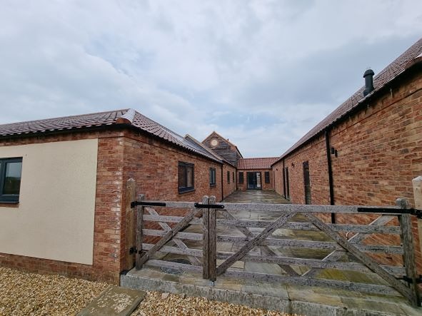 Planning permission for 2 new homes - conversion and subdivision of commercial property