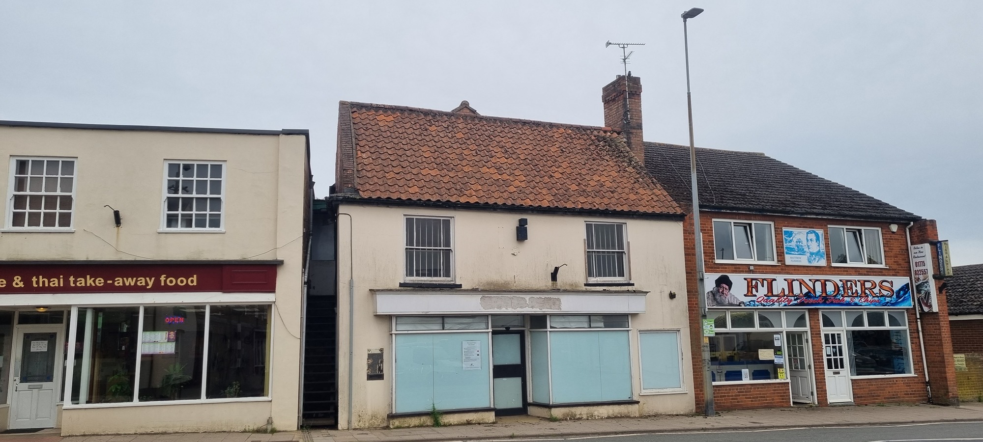 Planning permission secured for the conversion of a former bank into office and residential space in Donnington conservation area