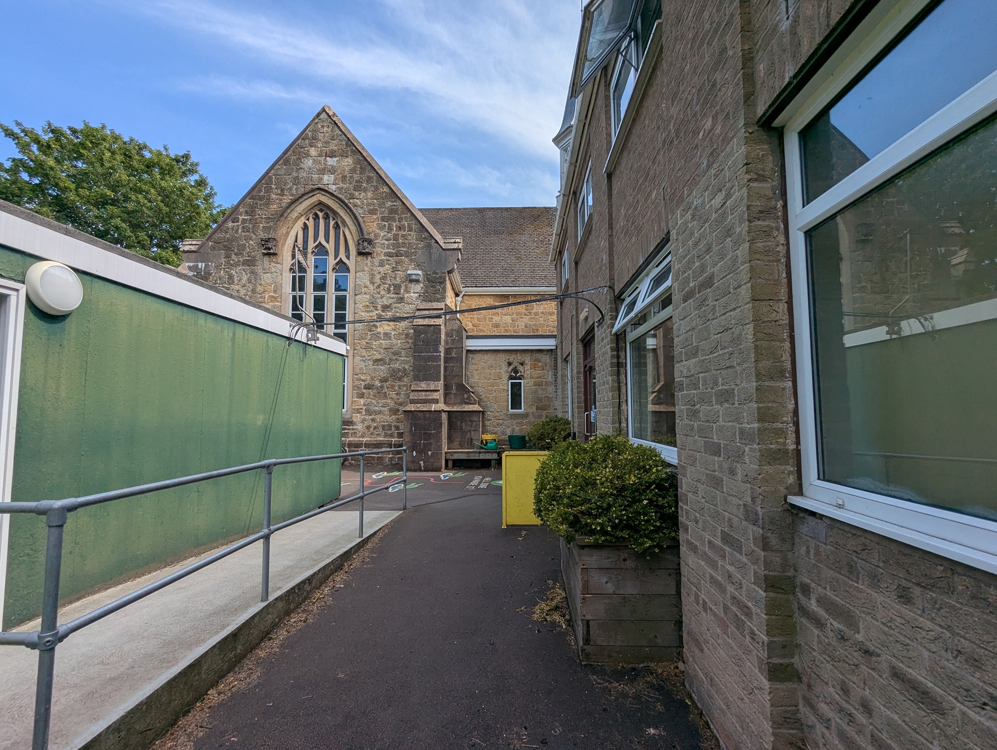 Heritage-sensitive school expansion and classroom conversion