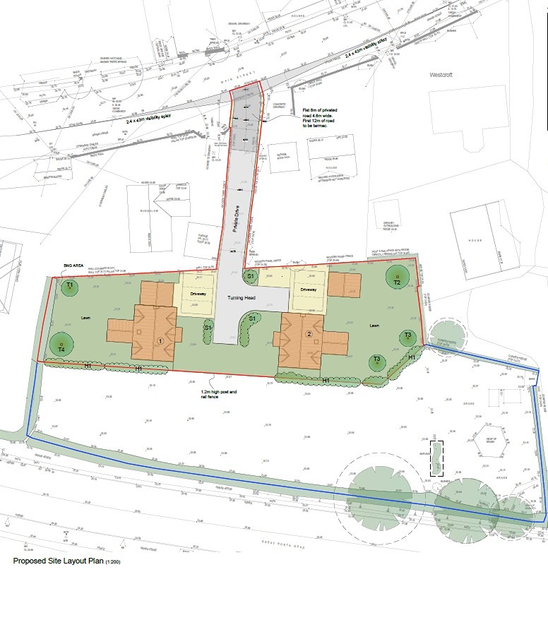 View of the development site at Lodge Farm, Weston, showing access between existing homes.