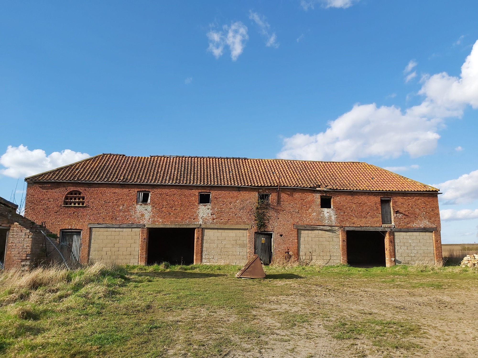 Redundant farm building converted into residential dwelling through planning permission