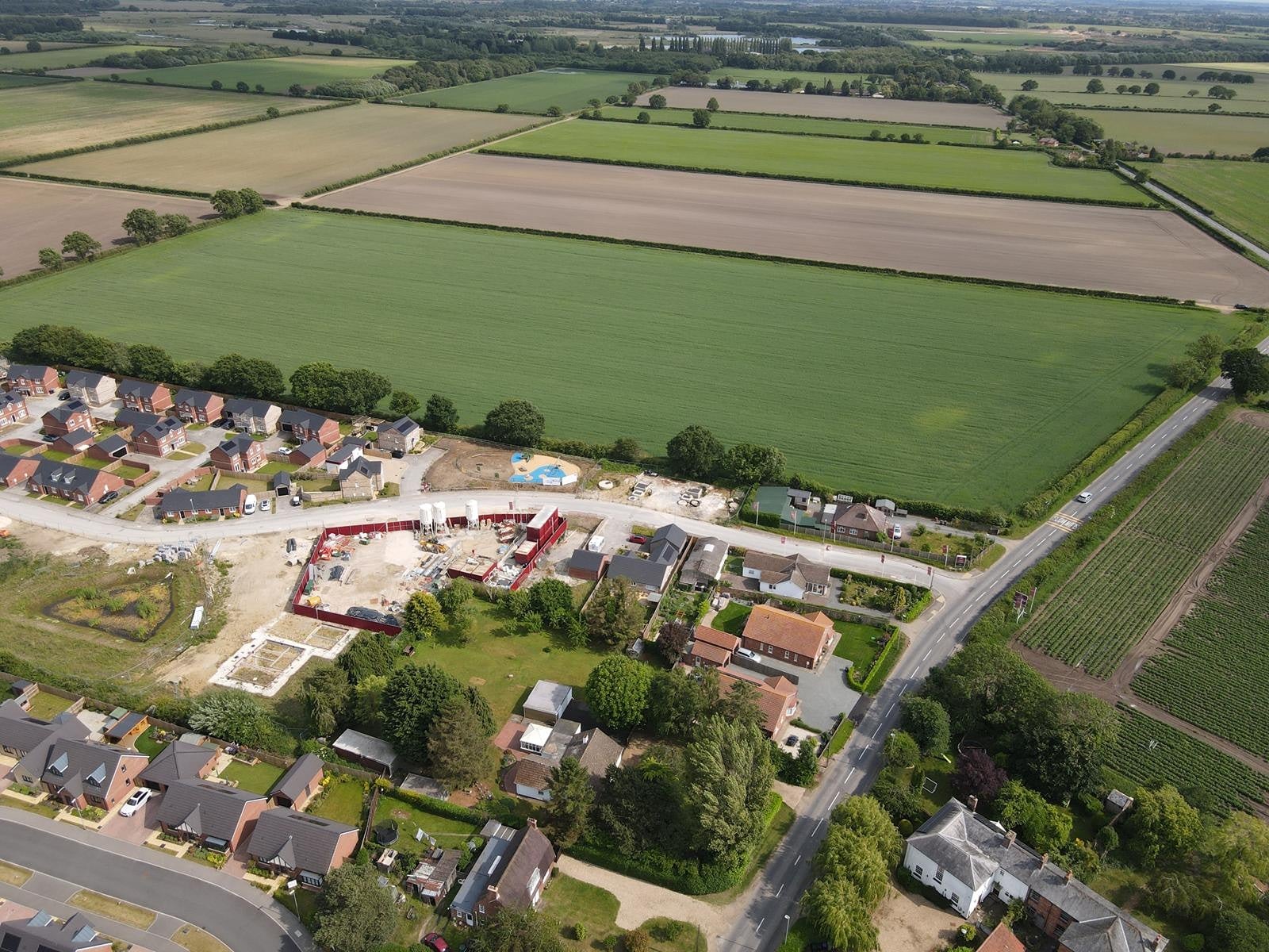 The site is located to the south side of the village directly adjacent to a new housing site
