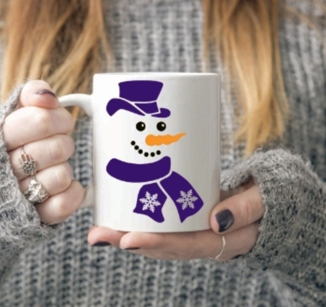 Snowman face mug with blue / purple scalf 