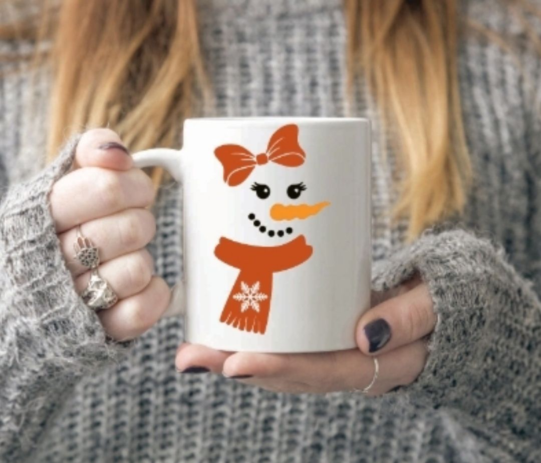 Snowman face mug with redy pink scalf 