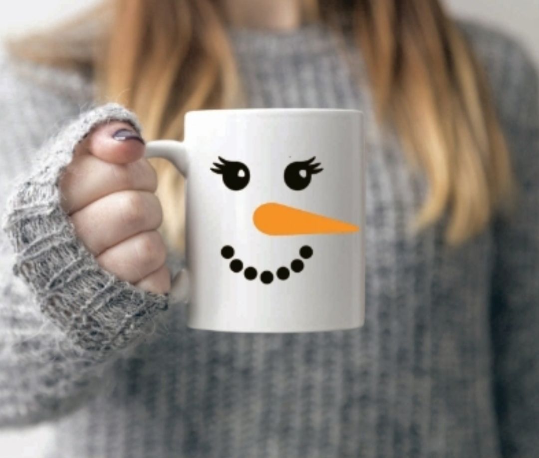 Snowman face mug with eyelashes 