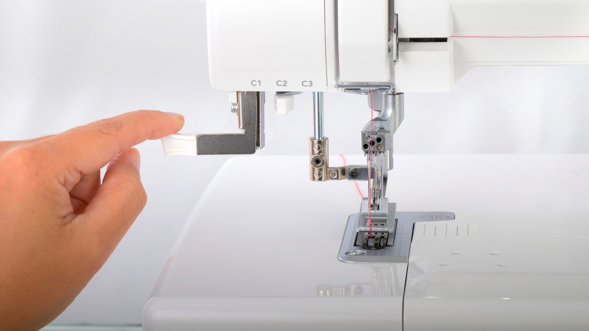 baby lock Euphoria built in needle threader - the first cover stitch machine to offer this