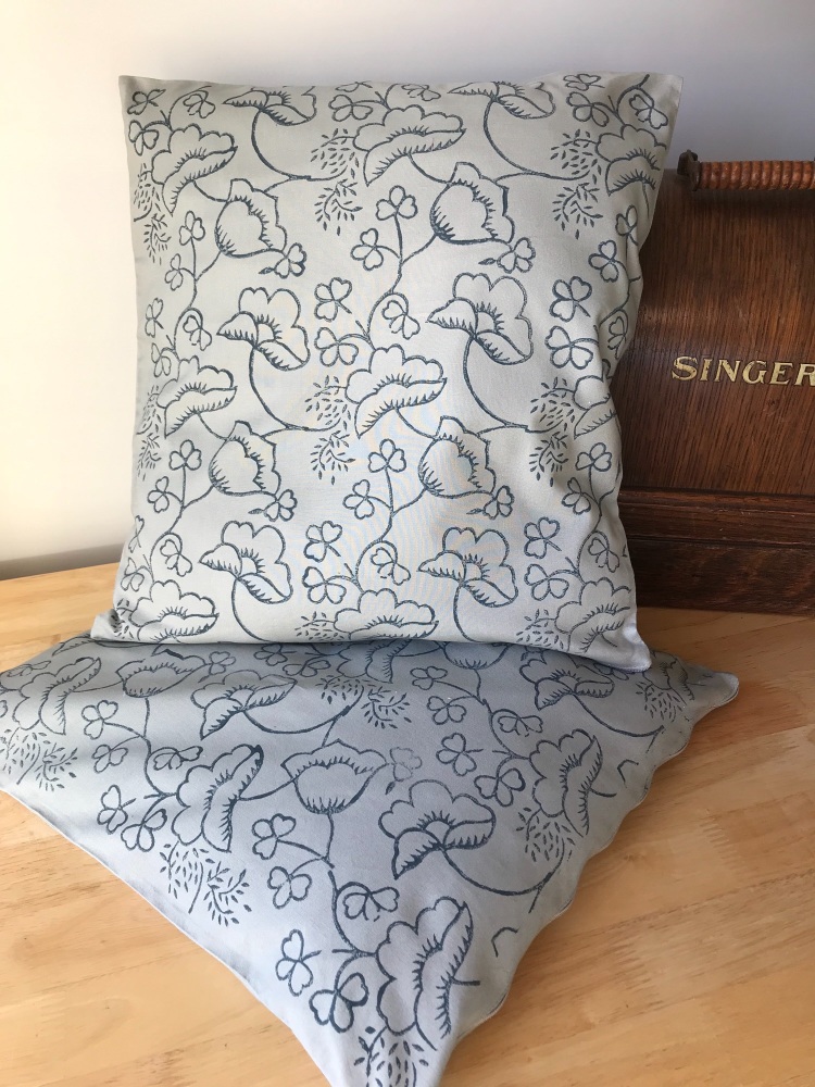 Grey hand printed tulip design cushion