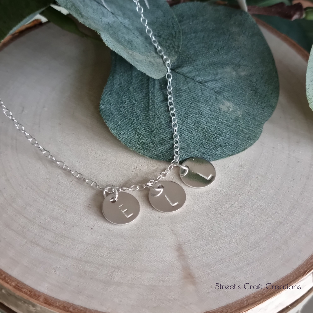 Hand stamped initial necklace by Streets Craft Creations