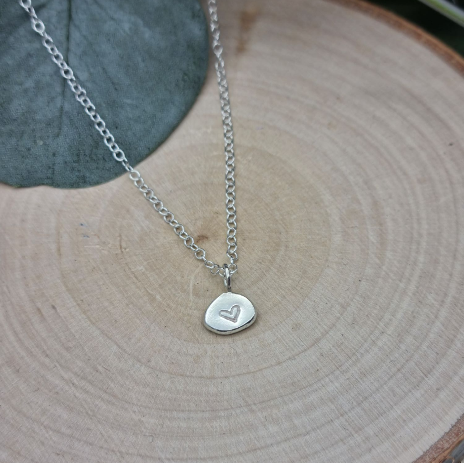 Pebble Love Necklace, handmade from recycled sterling silver and handstamped