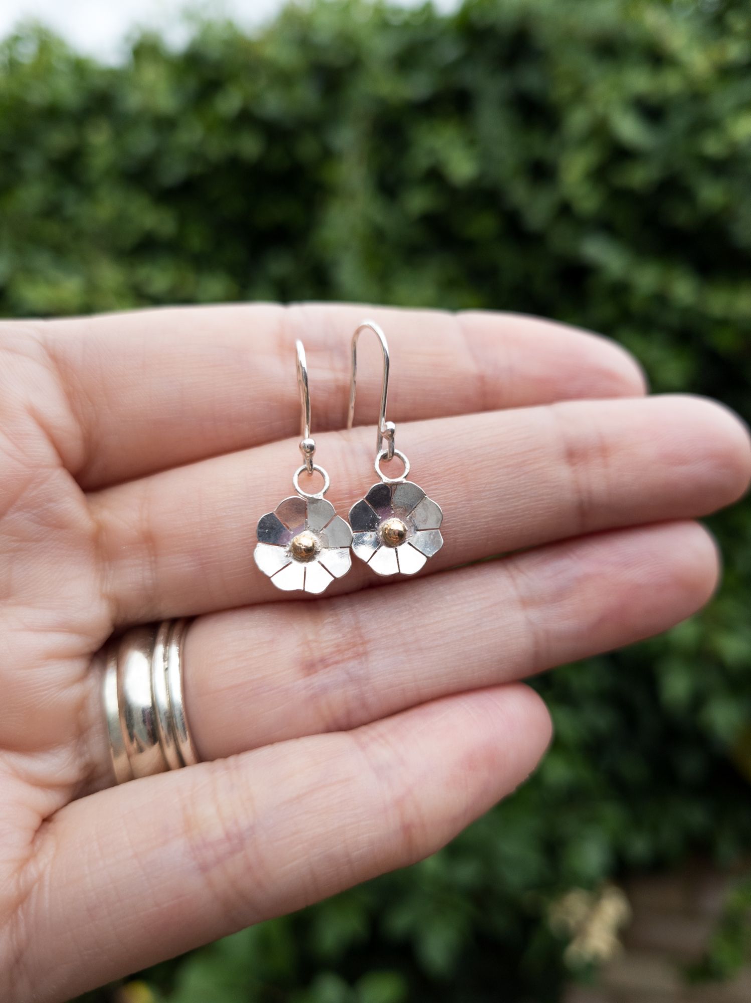Beautiful Daisy Earrings featuring sterling silver petals and 9ct gold. The perfect pair of Summer earrings