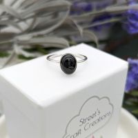 A handmade sterling silver and black onyx gemstone ring