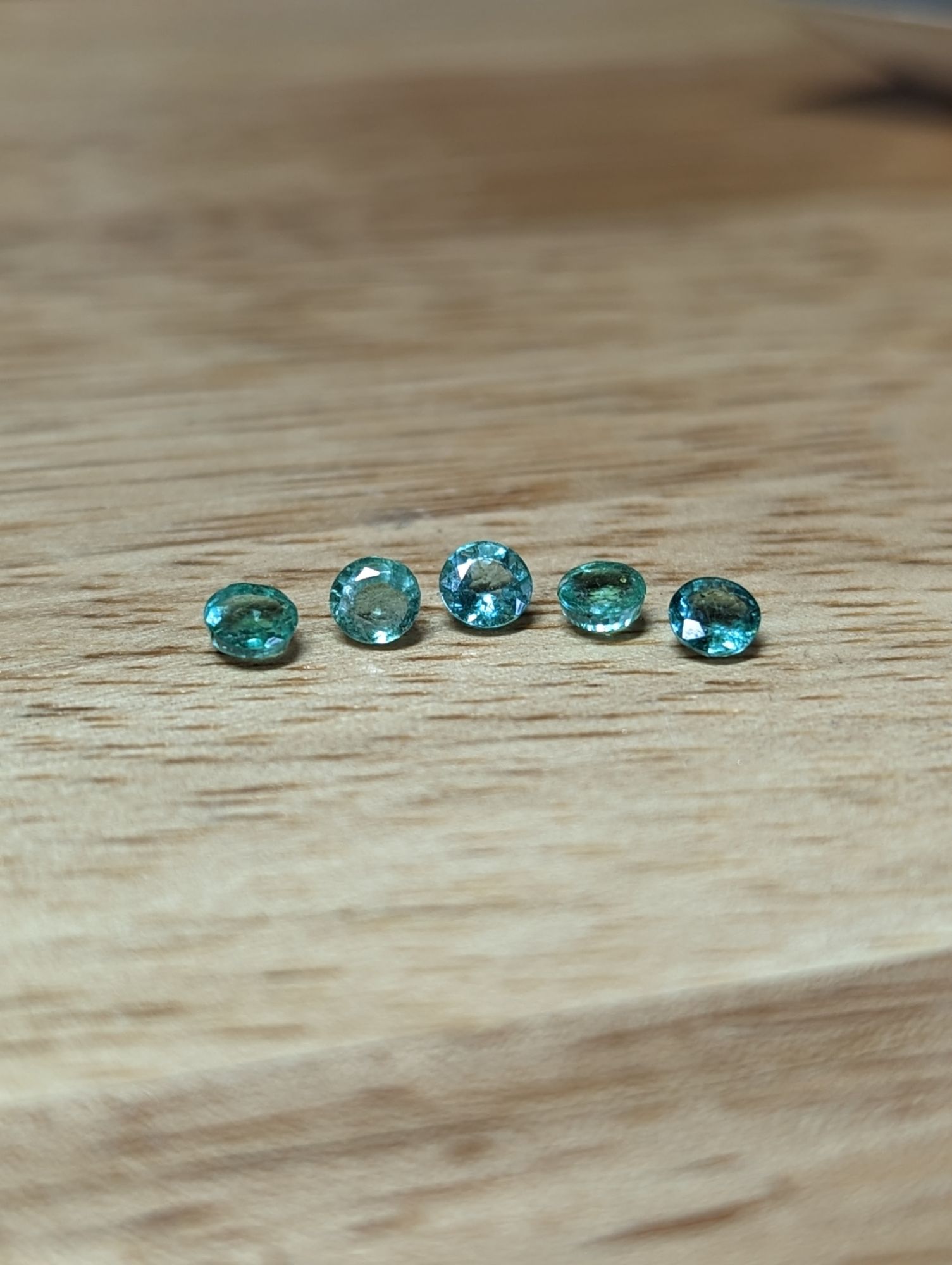 5 1980's cut round Emerald gemstones