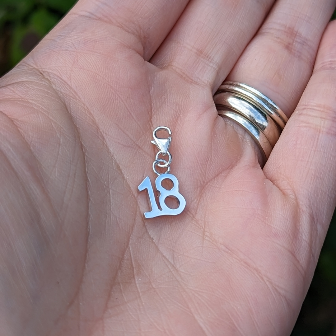 18th Silver charm for a bracelet