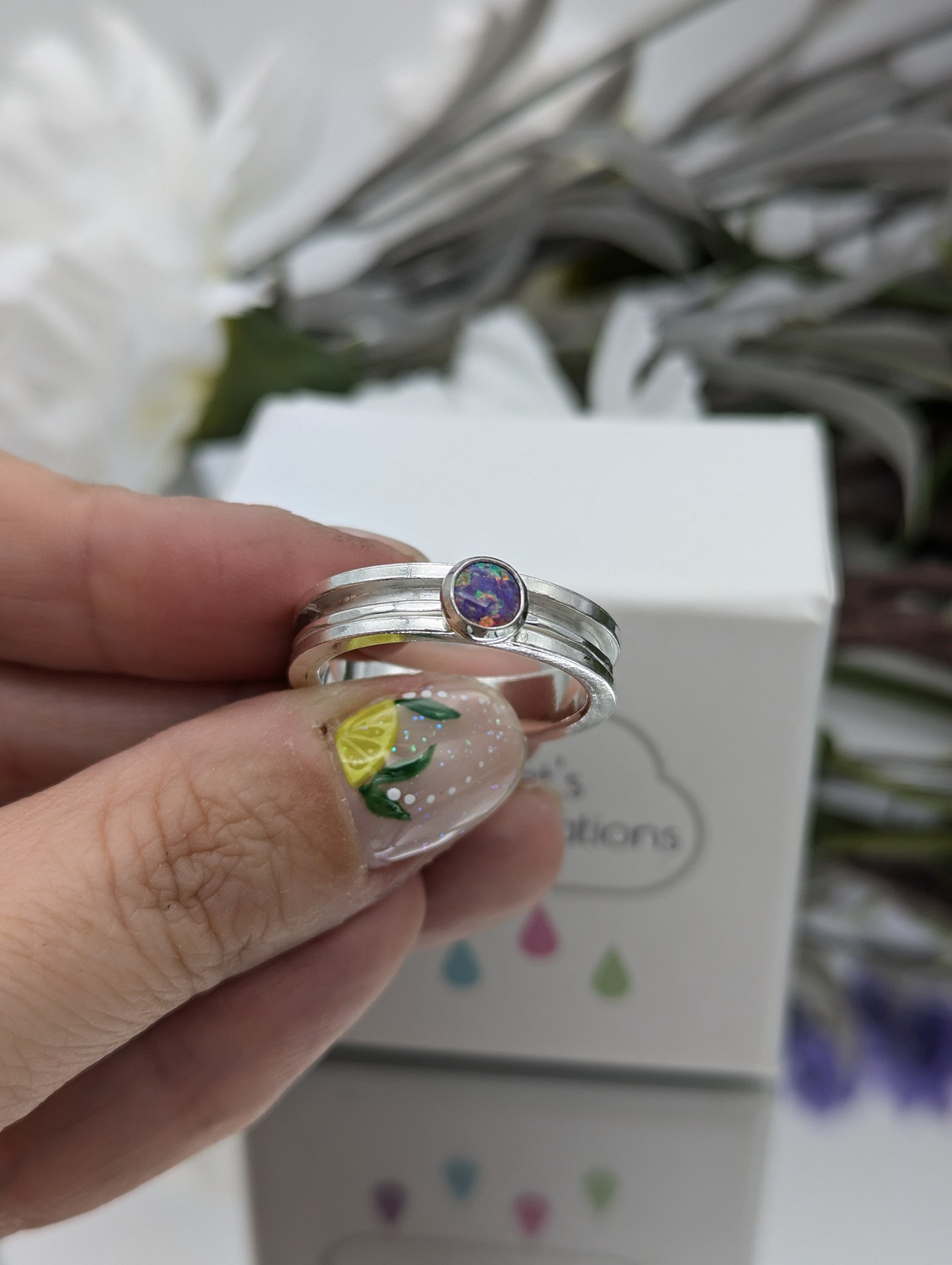 Silver and Created Opal Channel Spinner Ring