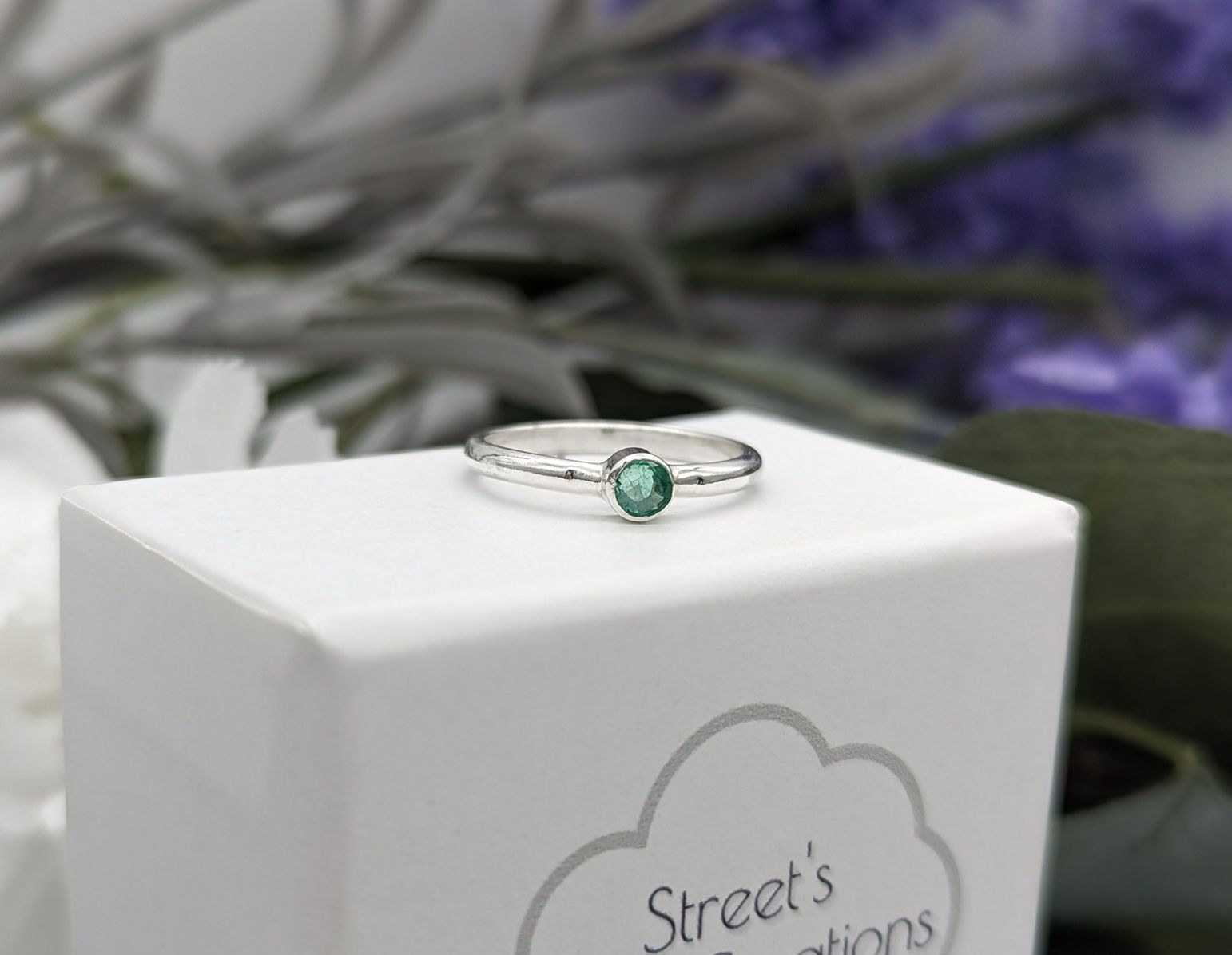Emerald and silver ring