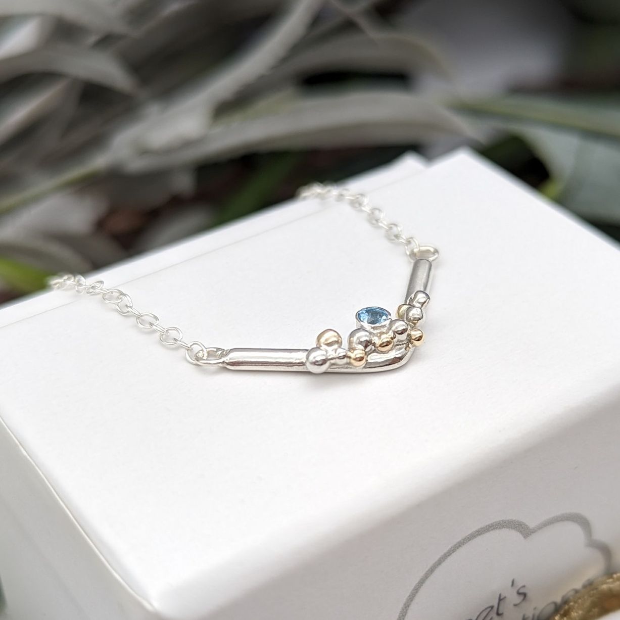 Swiss blue topaz gemstone necklace with silver & gold granulation