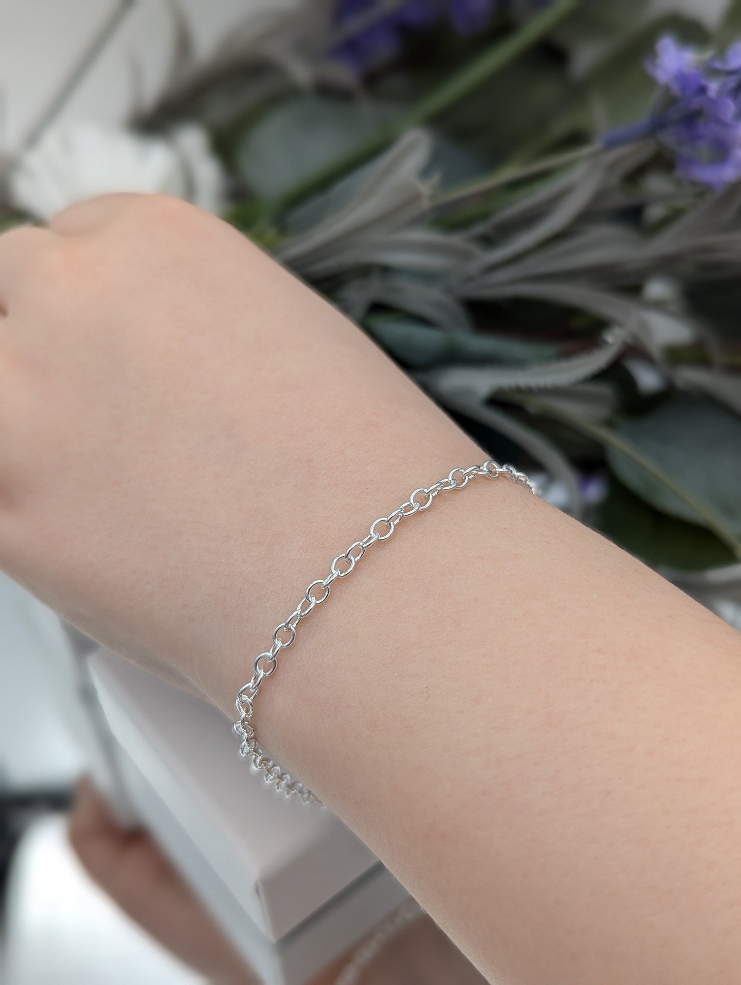 silver trace chain bracelet being modelled on a wrist
