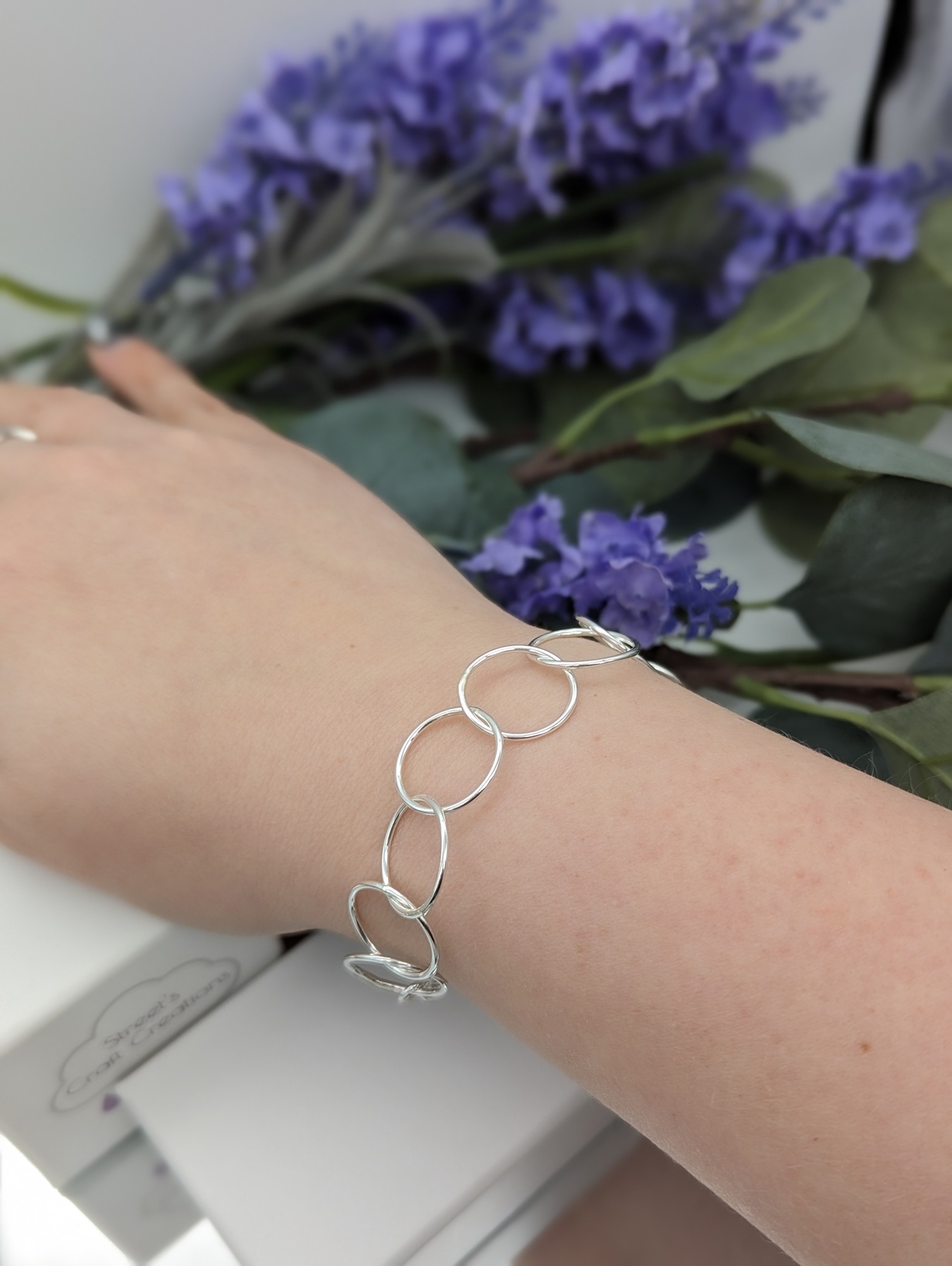 Circle link bracelet modelled on a wrist