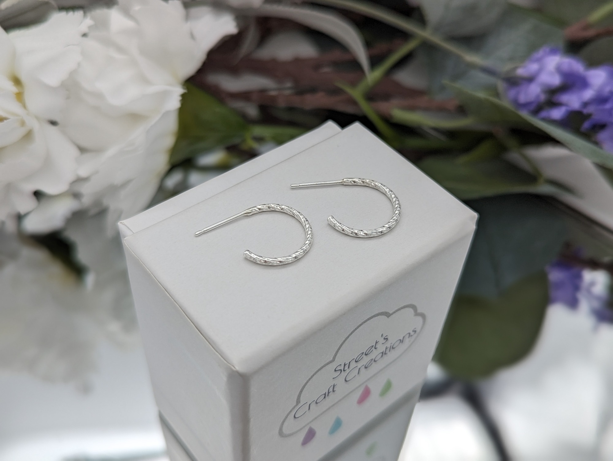 Silver diamond cut hoop earrings