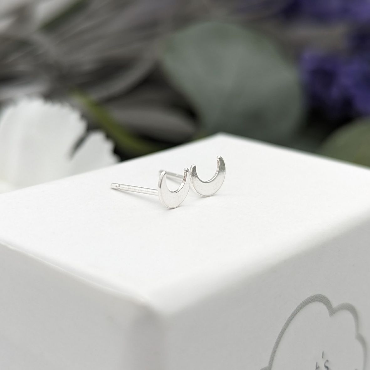 Crescent moon stud earrings