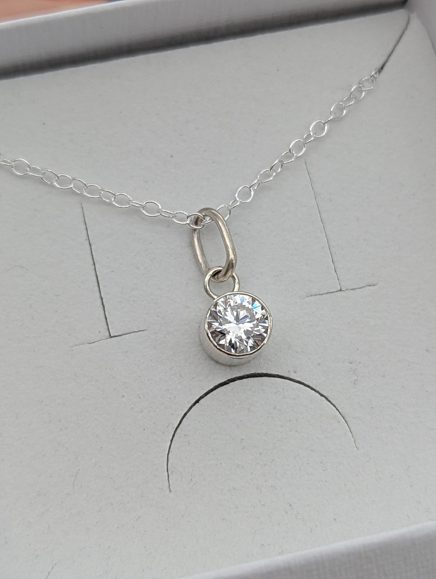 Close up of the CZ gemstone necklace