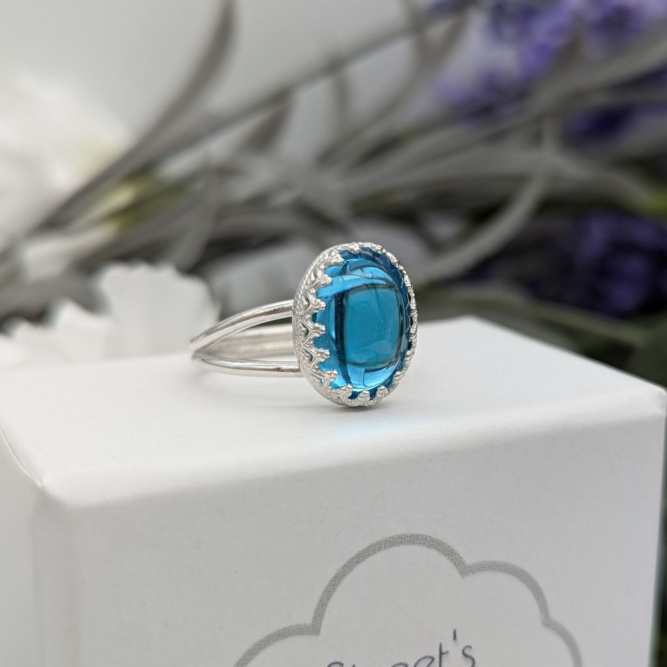 Silver ring with Aqua glass cabochon