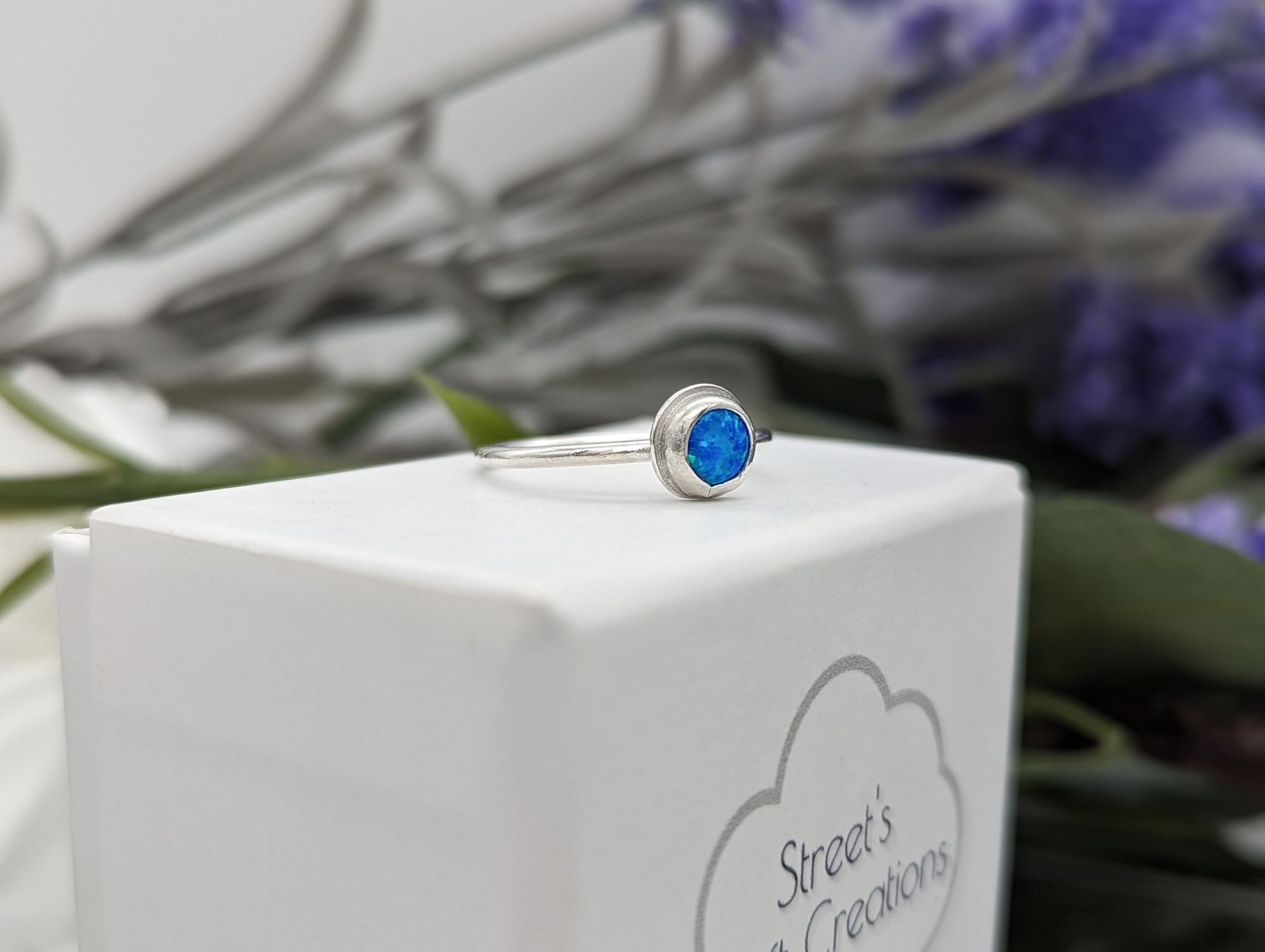 created blue opal & silver ring on the side profile