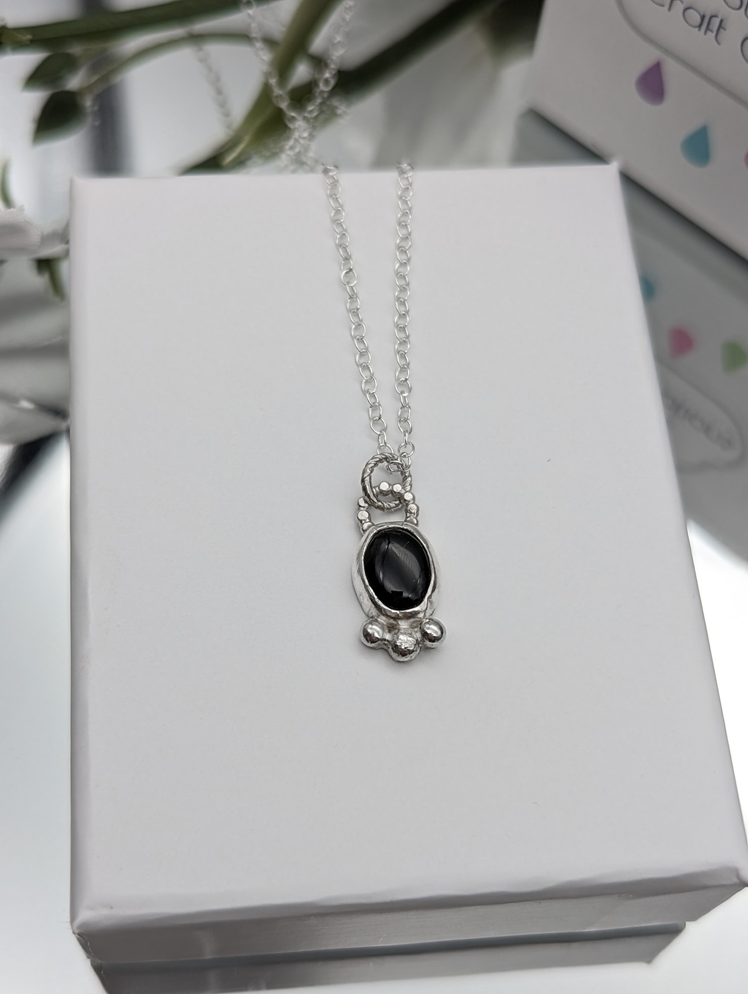 Black onyx gemstone and silver necklace