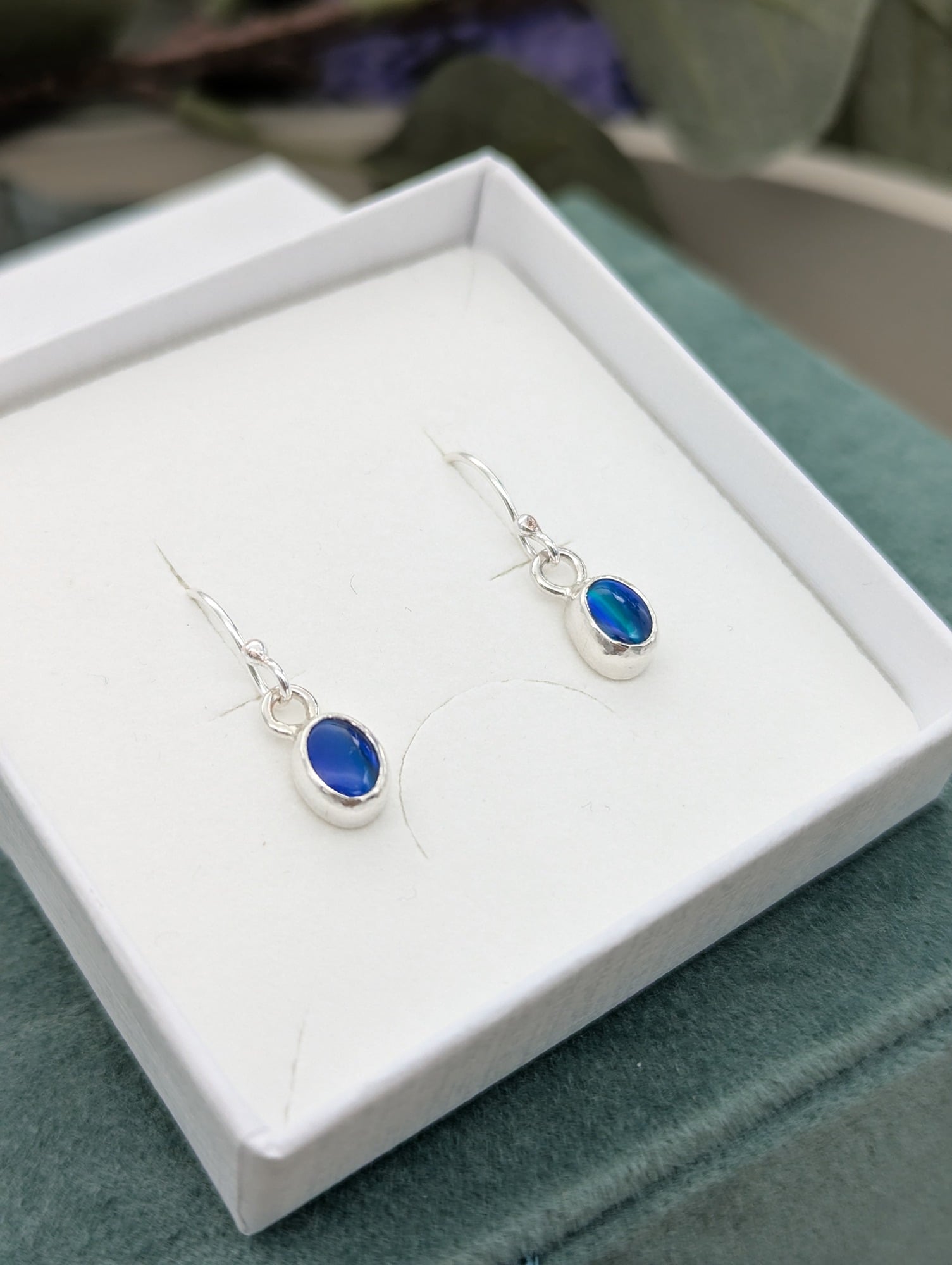 Silver Aurora Opal earrings presented in a gift box
