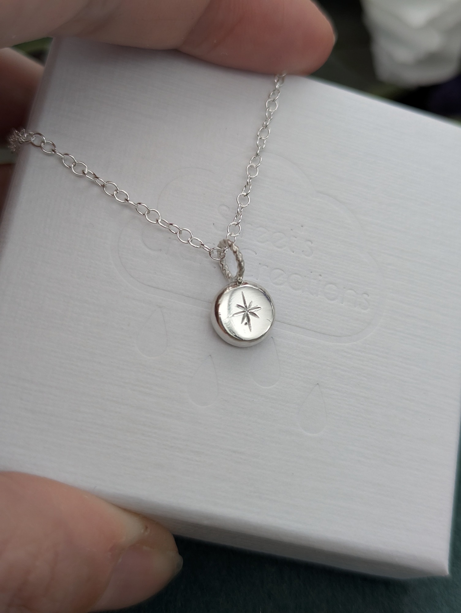 Sterling silver necklace with a North Star Engraving