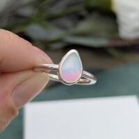 The soft blue pink Aurora Opal ring