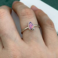 Handmade sterling silver Aurora Opal ring with playful colour ribbons